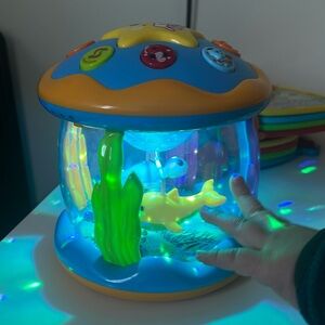 A Baby Music Game Drum with an Ocean Projection Light